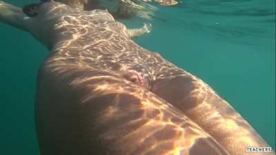 Nude model swims on a public vr doggystyle porn beach in Russia